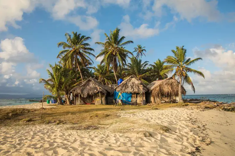 Serene beauty of San Blas Islands in Panama showcasing palm-fringed beaches and clear blue waters